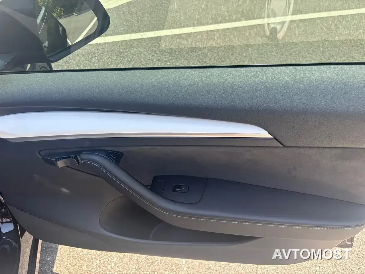 Tesla Model 3 — фото 14