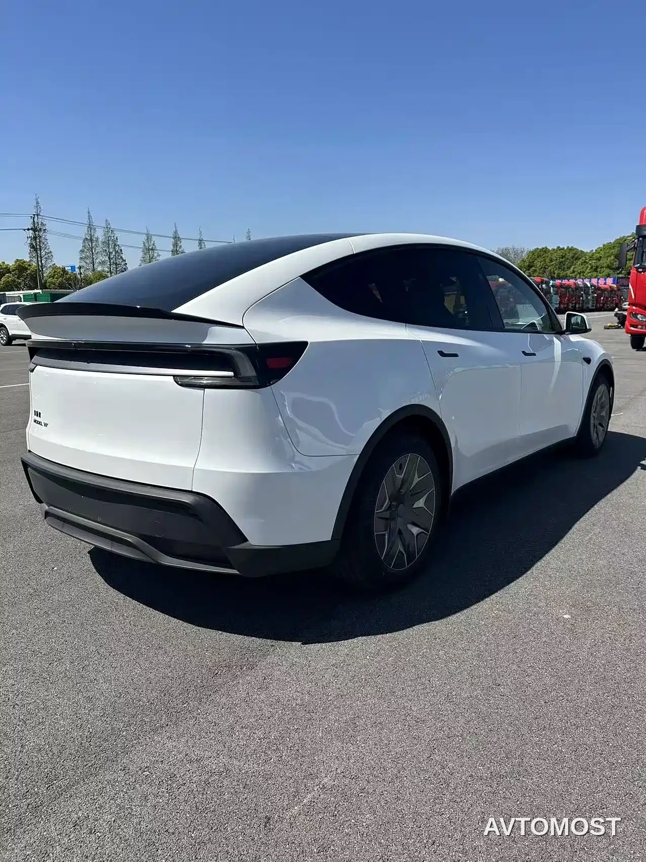 Tesla Model Y L Juniper — фото 15
