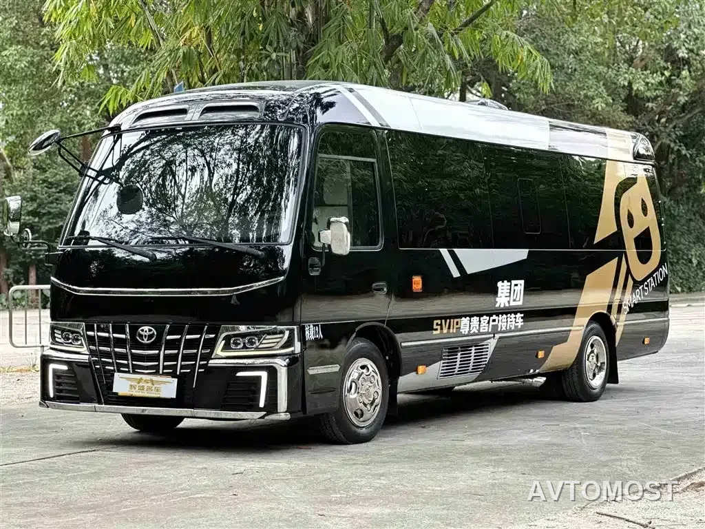 Toyota Coaster — фото 1