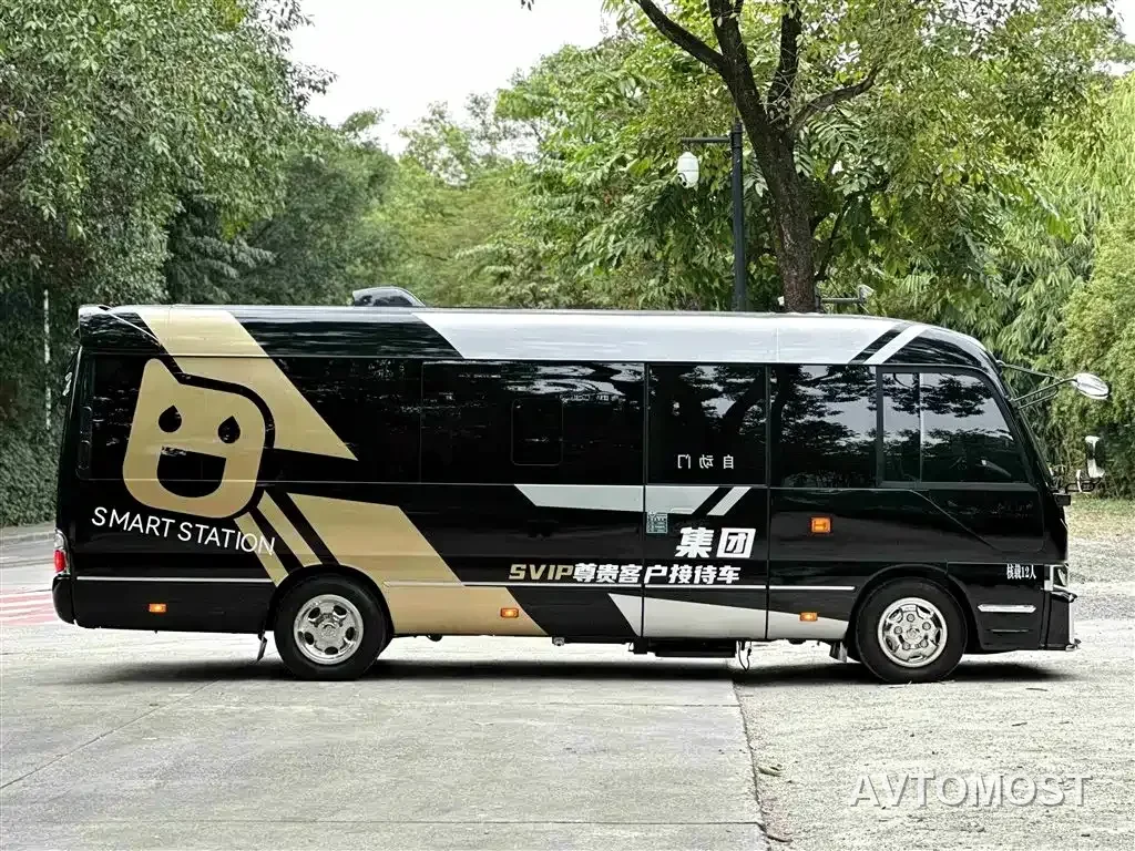 Toyota Coaster — фото 3