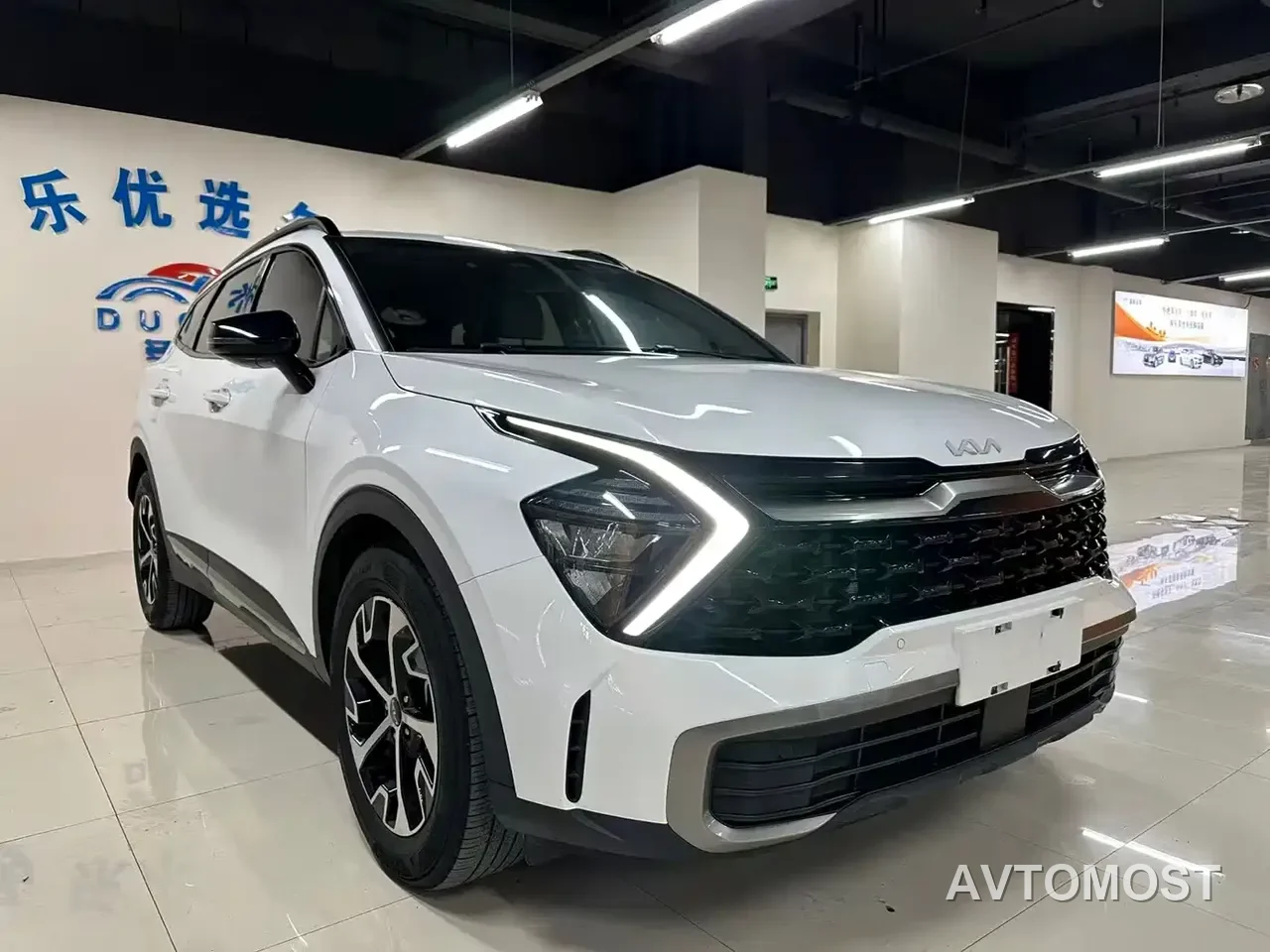 Kia Sportage 2023 2.0L HEV 2WD Premium Edition — фото 2