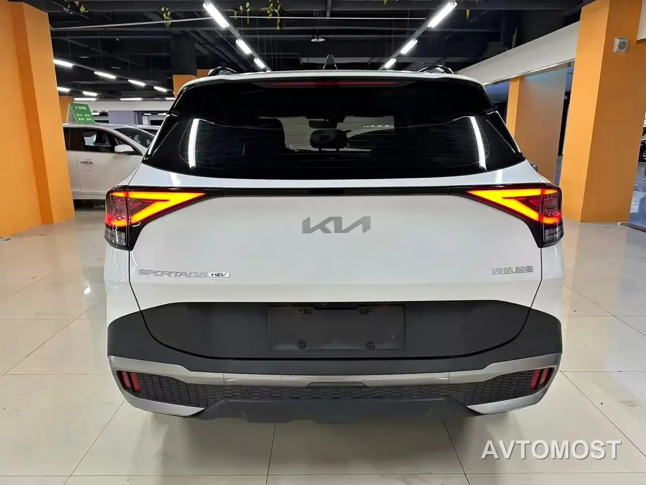 Kia Sportage 2023 2.0L HEV 2WD Premium Edition — фото 7