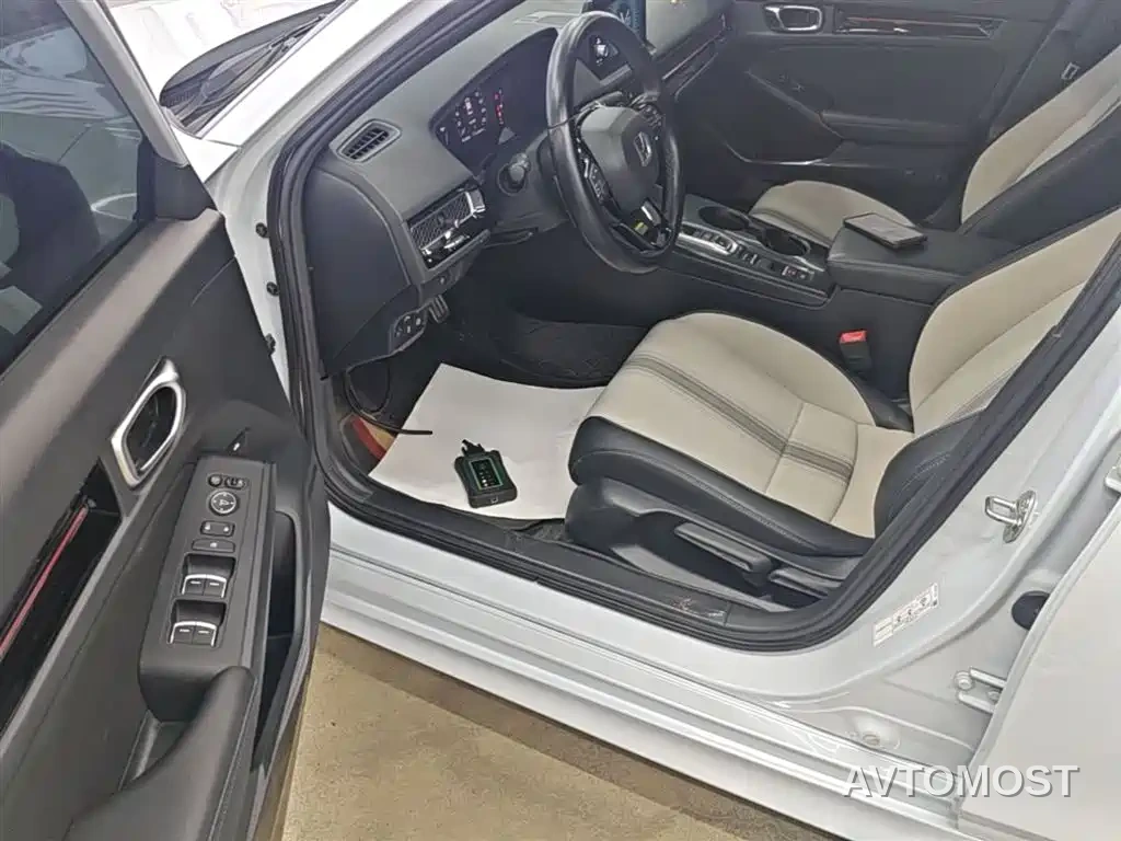 Honda Civic 2023 2.0L e:HEV Sharp Edition — фото 11
