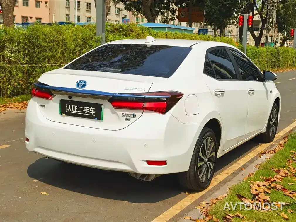 Toyota Corolla Twin Engine E+ 2019 1.8L E-CVT Leading Edition — фото 7