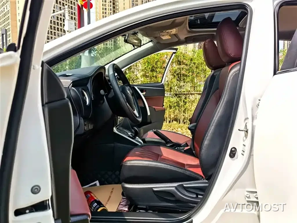Toyota Corolla Twin Engine E+ 2019 1.8L E-CVT Leading Edition — фото 9