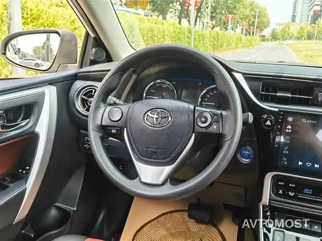 Toyota Corolla Twin Engine E+ 2019 1.8L E-CVT Leading Edition — фото 11