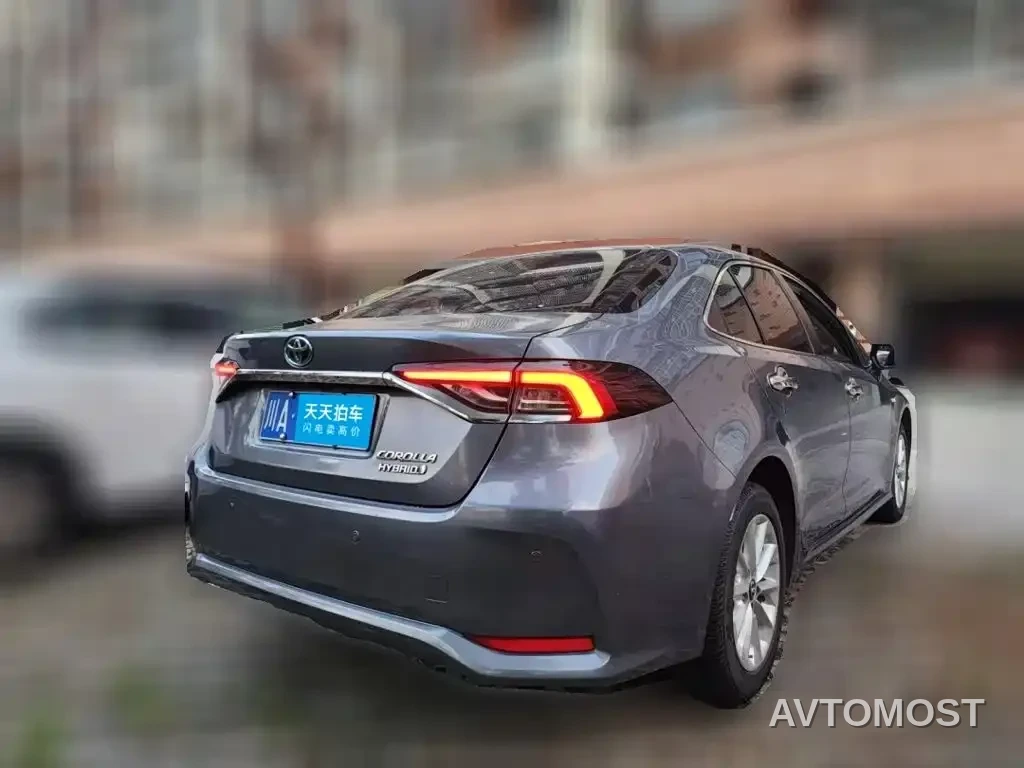 Toyota Corolla 2021 Hybrid 1.8L E-CVT Elite Edition — фото 2