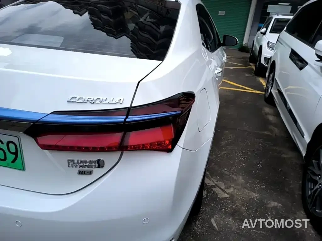 Toyota Corolla Twin Engine E+ 2019 1.8L E-CVT Leading Edition — фото 8