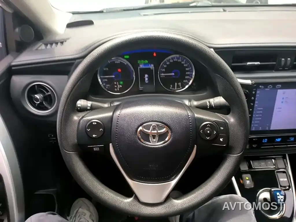 Toyota Corolla Twin Engine E+ 2019 1.8L E-CVT Leading Edition — фото 11