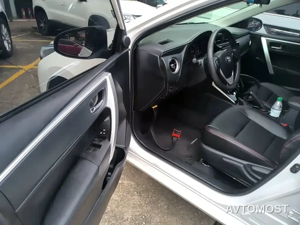 Toyota Corolla Twin Engine E+ 2019 1.8L E-CVT Leading Edition — фото 16