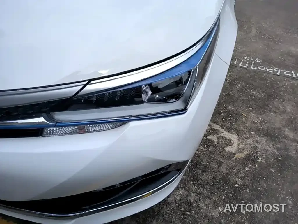 Toyota Corolla Twin Engine E+ 2019 1.8L E-CVT Leading Edition — фото 23