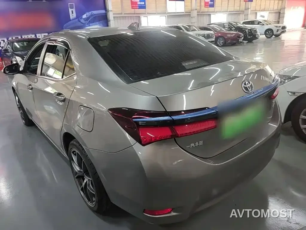 Toyota Corolla Twin Engine E+ 2019 1.8L E-CVT Leading Edition — фото 5