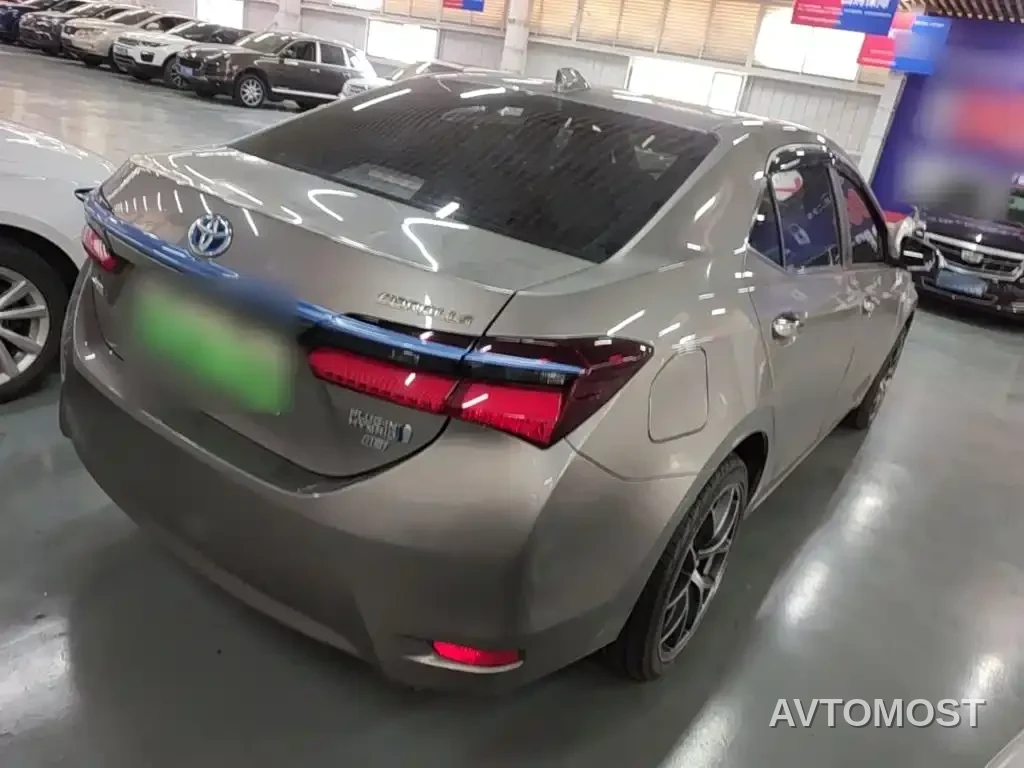 Toyota Corolla Twin Engine E+ 2019 1.8L E-CVT Leading Edition — фото 7