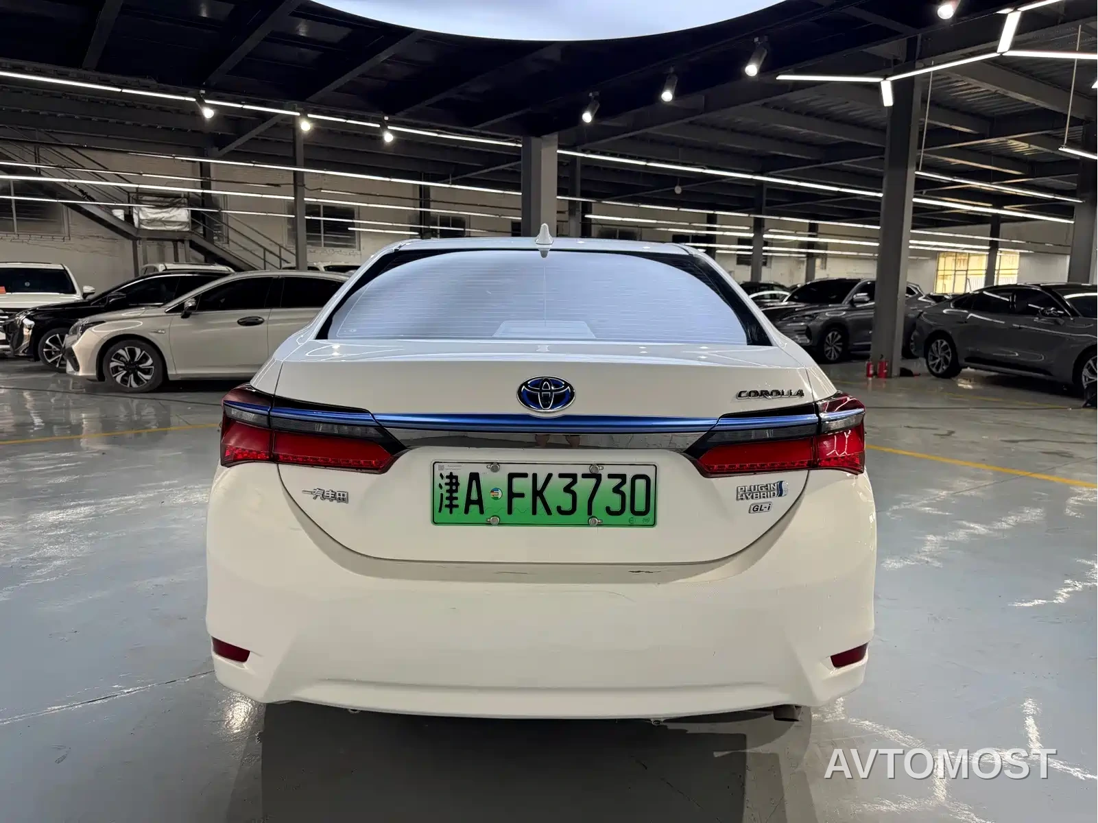 Toyota Corolla Twin Engine E+ 2019 1.8L E-CVT Leading Edition — фото 11