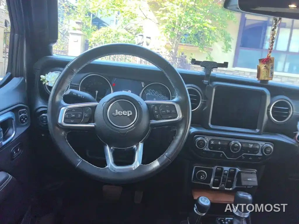 Jeep Wrangler 4xe 2021 4-Door 2.0T 4xe Sahara — фото 11