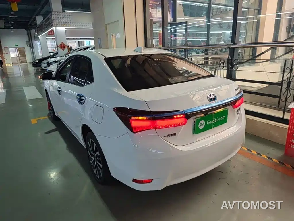 Toyota Corolla Twin Engine E+ 2019 1.8L E-CVT Leading Edition — фото 5