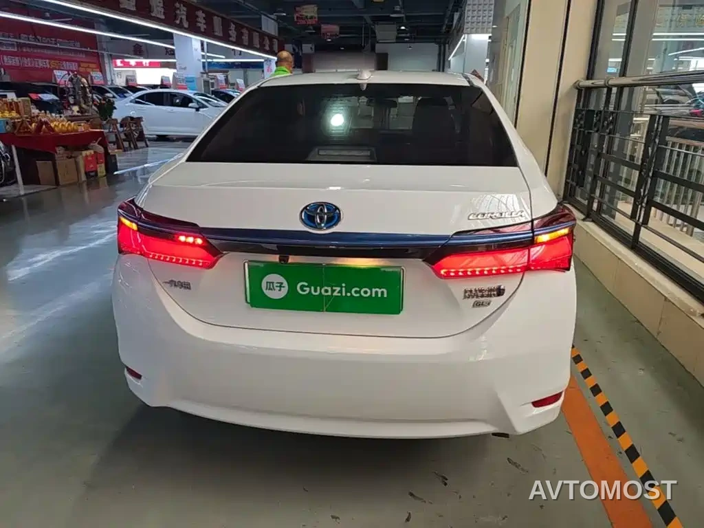 Toyota Corolla Twin Engine E+ 2019 1.8L E-CVT Leading Edition — фото 6