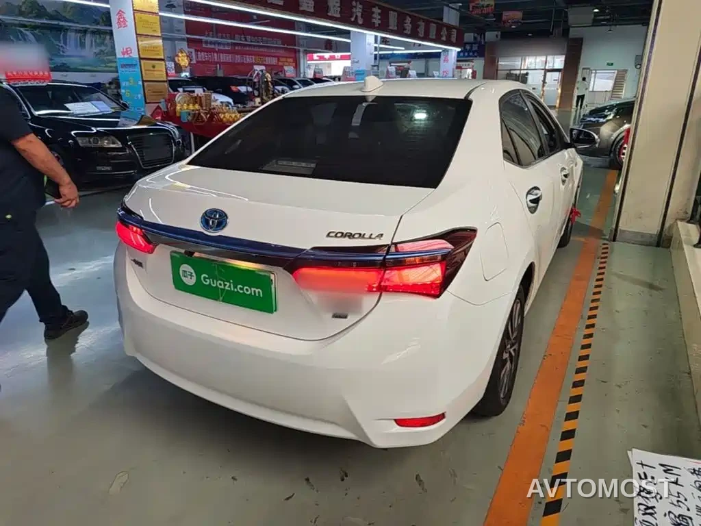 Toyota Corolla Twin Engine E+ 2019 1.8L E-CVT Leading Edition — фото 7