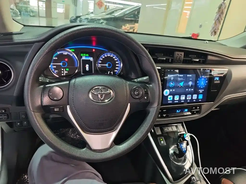 Toyota Corolla Twin Engine E+ 2019 1.8L E-CVT Leading Edition — фото 10