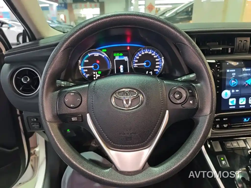 Toyota Corolla Twin Engine E+ 2019 1.8L E-CVT Leading Edition — фото 11